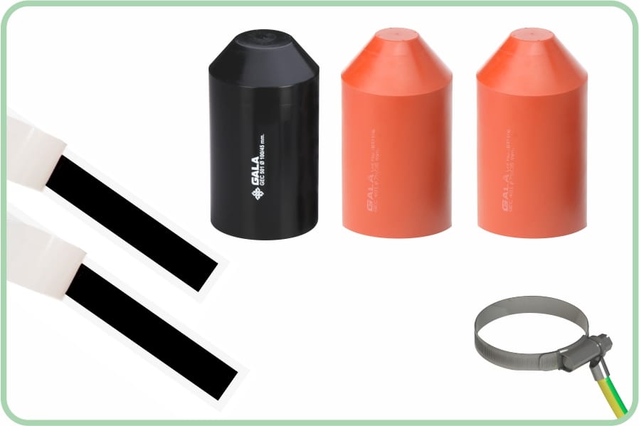 A black screened end cap alongside two red insulating end caps, two strips of black sealing mastic, and a stainless steel worm-drive band with a green and yellow earth lead crimped to it.